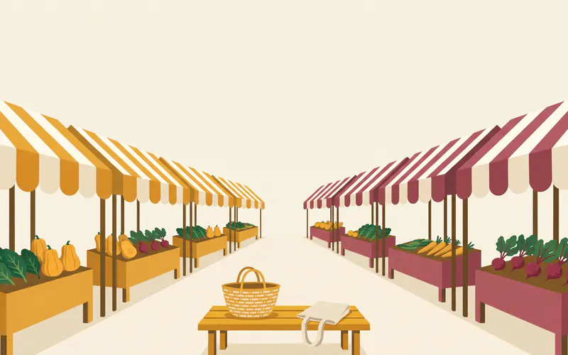 An empty woven basket and a folded canvas tote on a bench at the entrance of a sunny farmers market, striped awnings stretching into the distance