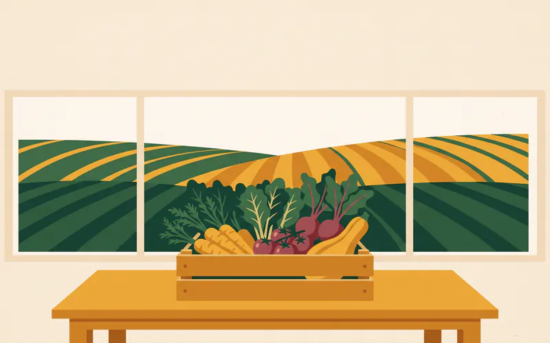 A wooden farm-share crate overflowing with greens, carrots, beets, tomatoes and squash on a farmhouse kitchen table, fields through the window