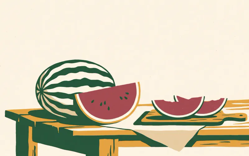A whole striped watermelon beside a large cut wedge showing red flesh and seeds, with slices on a cutting board